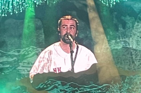 Noah Kahan singing at Fenway Park