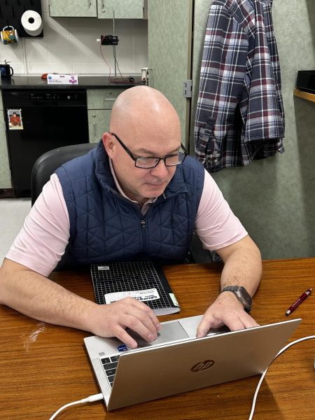 Mr. Galloway in his office.