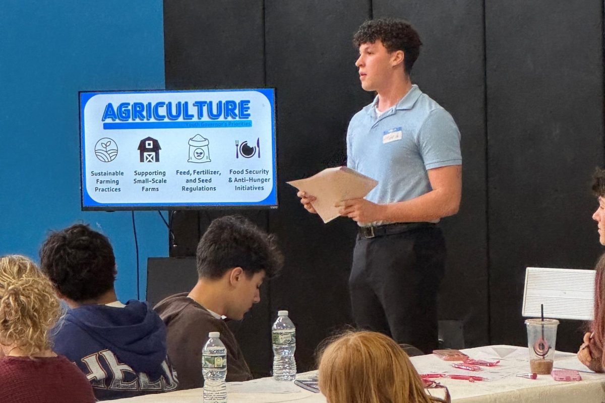 Noah Babbin, Youth Governor and GHS senior, presents.